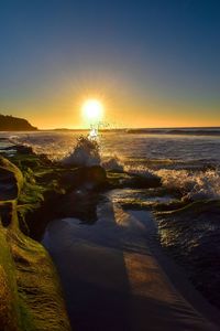 Scenic view of sea against sky during sunset