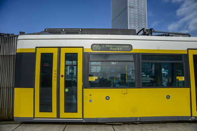 Yellow train against sky