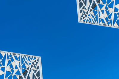 Low angle view of building against blue sky