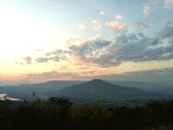 Scenic view of mountains against sky during sunset