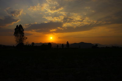 Scenic view of silhouette landscape against sky during sunset