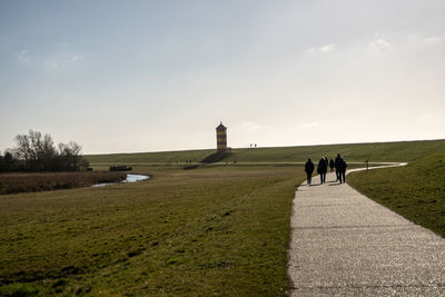 People walking on field