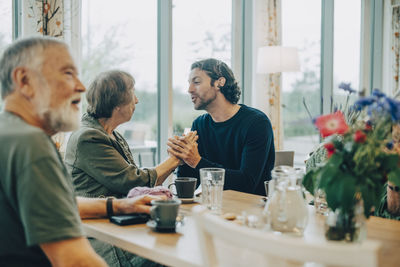 Group of people sitting at table