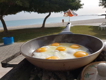 Close-up of omelet preparing in pan