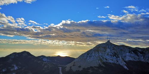 Scenic view of snowcapped mountains against sky during winter