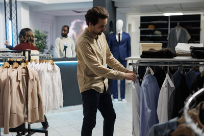 Low angle view of couple standing in store