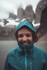 Portrait of a smiling woman in snow