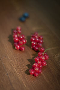 Close-up of cherries on table