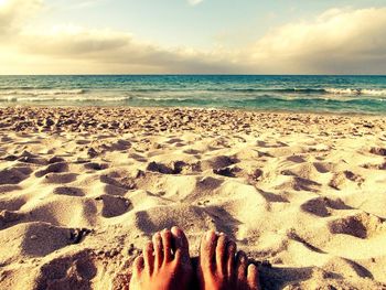 Scenic view of beach against sky