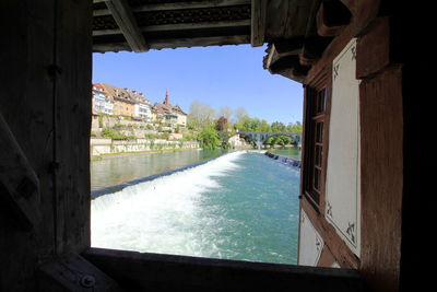 Buildings seen through window