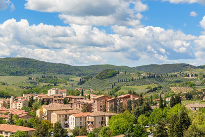 View of an italian landscape with rolling hills from a city