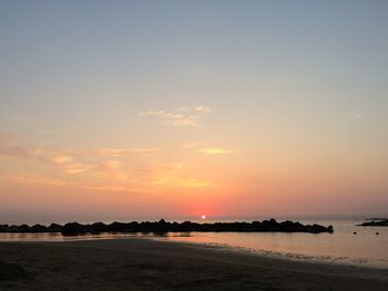 Scenic view of sea at sunset