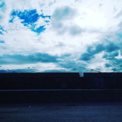 View of building against cloudy sky