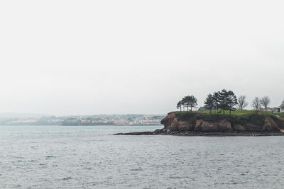 Scenic view of sea against clear sky