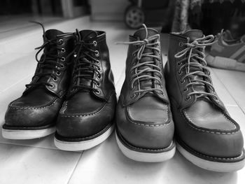 Close-up of shoes on floor at home