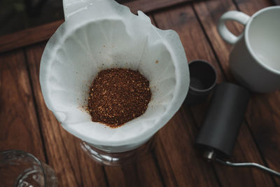 Barista dripping coffee and slow coffee bar style