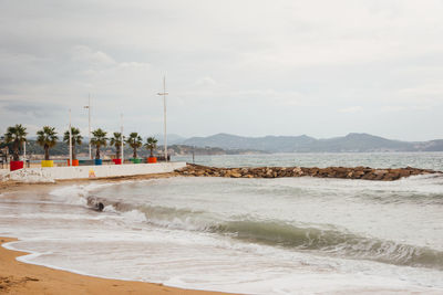 Scenic view of beach against sky