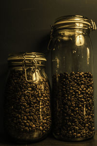 Close-up of coffee beans in jar 