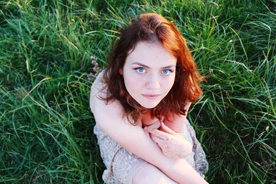 Portrait of woman on field