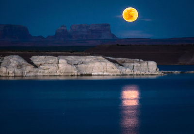 View of calm blue sea at night