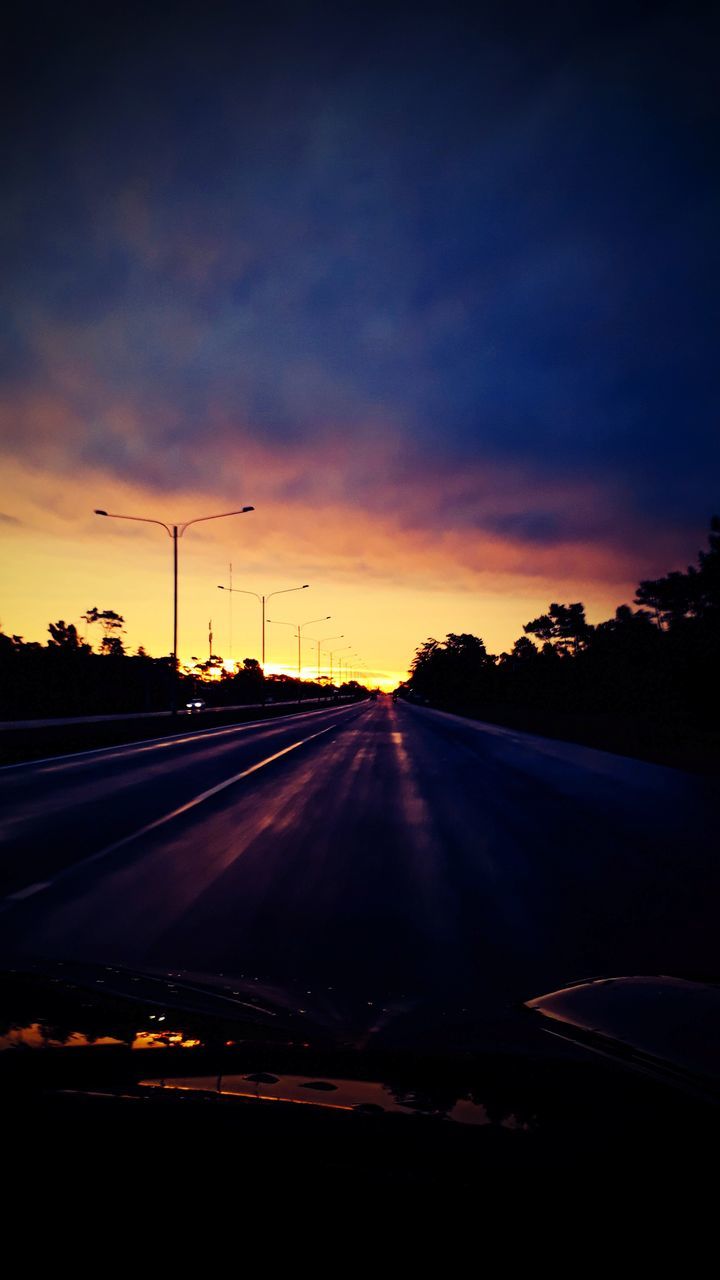 sunset, road, transportation, sky, car, no people, orange color, the way forward, silhouette, car point of view, scenics, nature, cloud - sky, land vehicle, beauty in nature, road trip, landscape, outdoors, tree, day