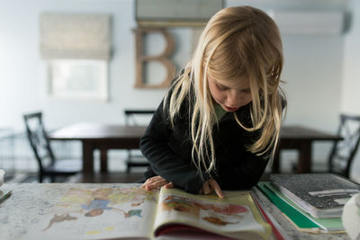 Little girl learning to read