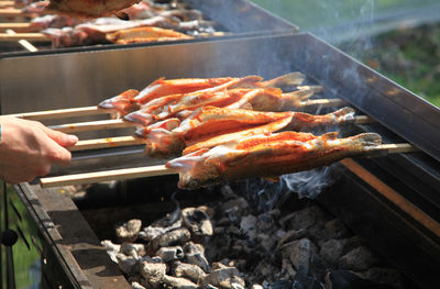 High angle view of meat on barbecue grill