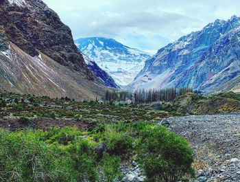 Scenic view of snowcapped mountains against sky