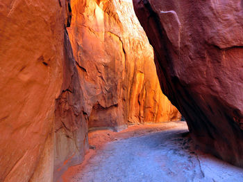 Walkway amidst rock formations