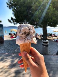 Woman holding ice cream cone