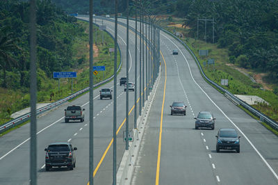 High angle view of cars on road in city