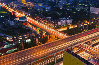 High angle view of light trails on city street