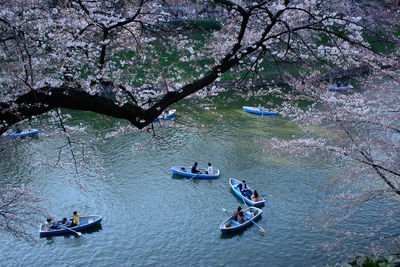 High angle view of people on boat in river