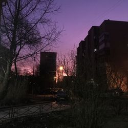 View of buildings in city at night