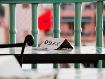 Close-up of text on table