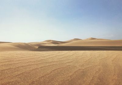 Scenic view of desert against sky