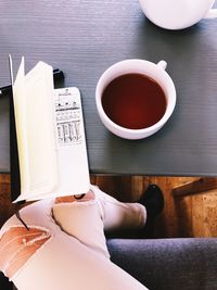 High angle view of coffee cup on table