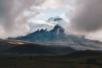 Scenic view of snowcapped mountains against sky