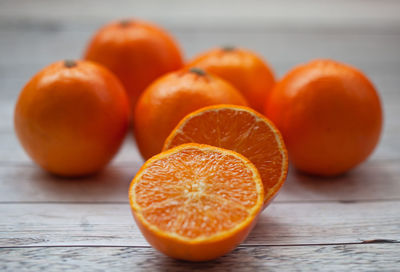 Close-up of oranges on table