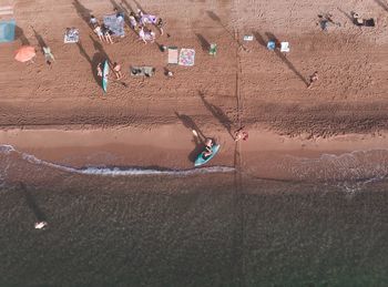 High angle view of man on sand in desert