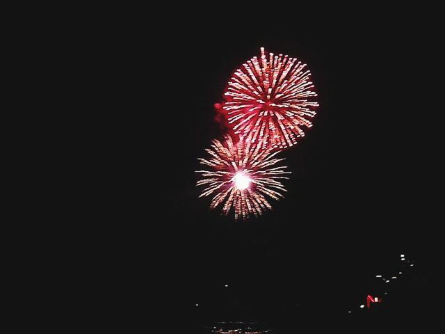 night, illuminated, firework display, exploding, celebration, long exposure, glowing, arts culture and entertainment, firework - man made object, motion, event, sparks, low angle view, firework, entertainment, multi colored, blurred motion, fire - natural phenomenon, sky, celebration event