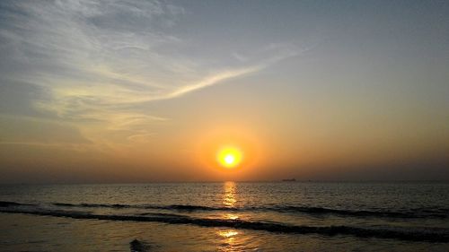 Scenic view of sea at sunset