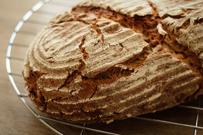 Close-up bread with rye and walnuts in back lit