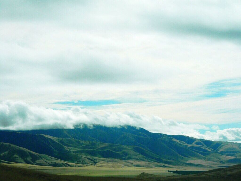 SCENIC VIEW OF MOUNTAIN AGAINST SKY