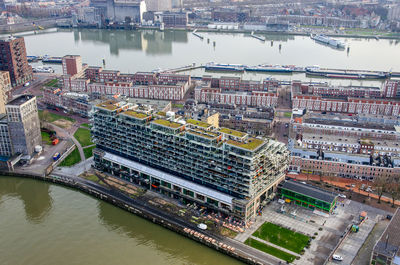 Katendrecht neighbourhood with residential building on top of old warehouse, between two harbours