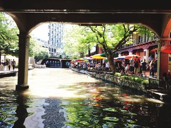 Canal passing through city buildings