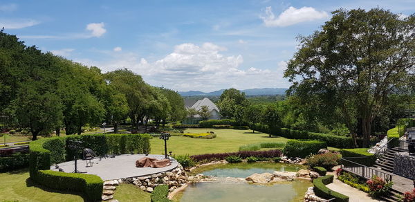 Panoramic view of lake and trees against sky