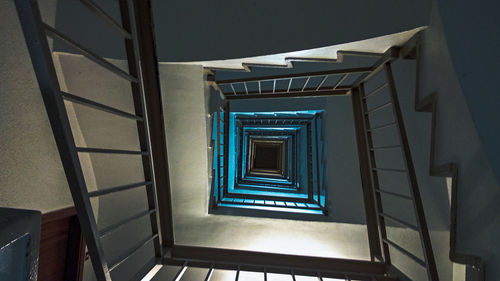 Directly below shot of spiral staircase of building