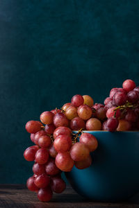 Close-up of grapes on table