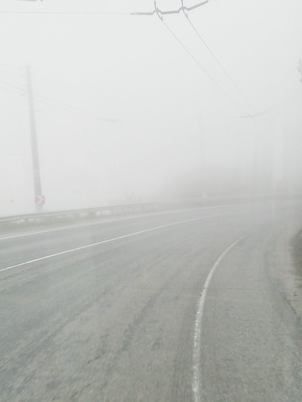 the way forward, transportation, fog, road, diminishing perspective, foggy, vanishing point, empty, weather, copy space, long, connection, road marking, day, street, no people, empty road, outdoors, built structure